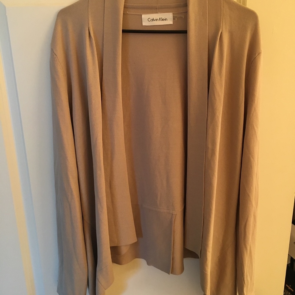 Cape with sleeves